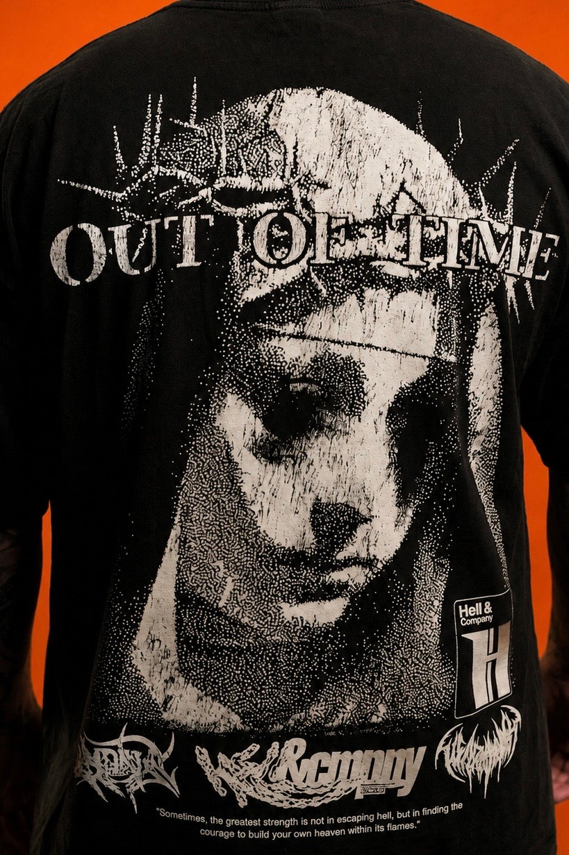 Black t-shirt with a graphic design of a face and 'Out of Time' text on an orange background