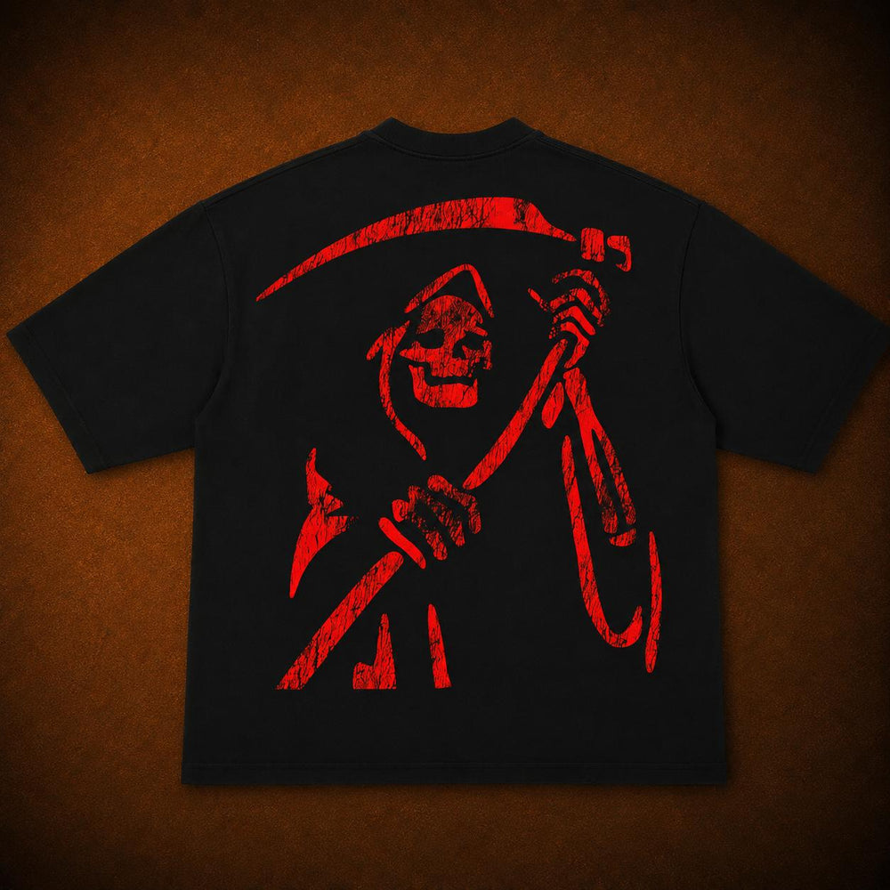 A black short-sleeve t-shirt laid flat against a textured brown background, featuring a large distressed red graphic of a grim reaper holding a scythe on the back.